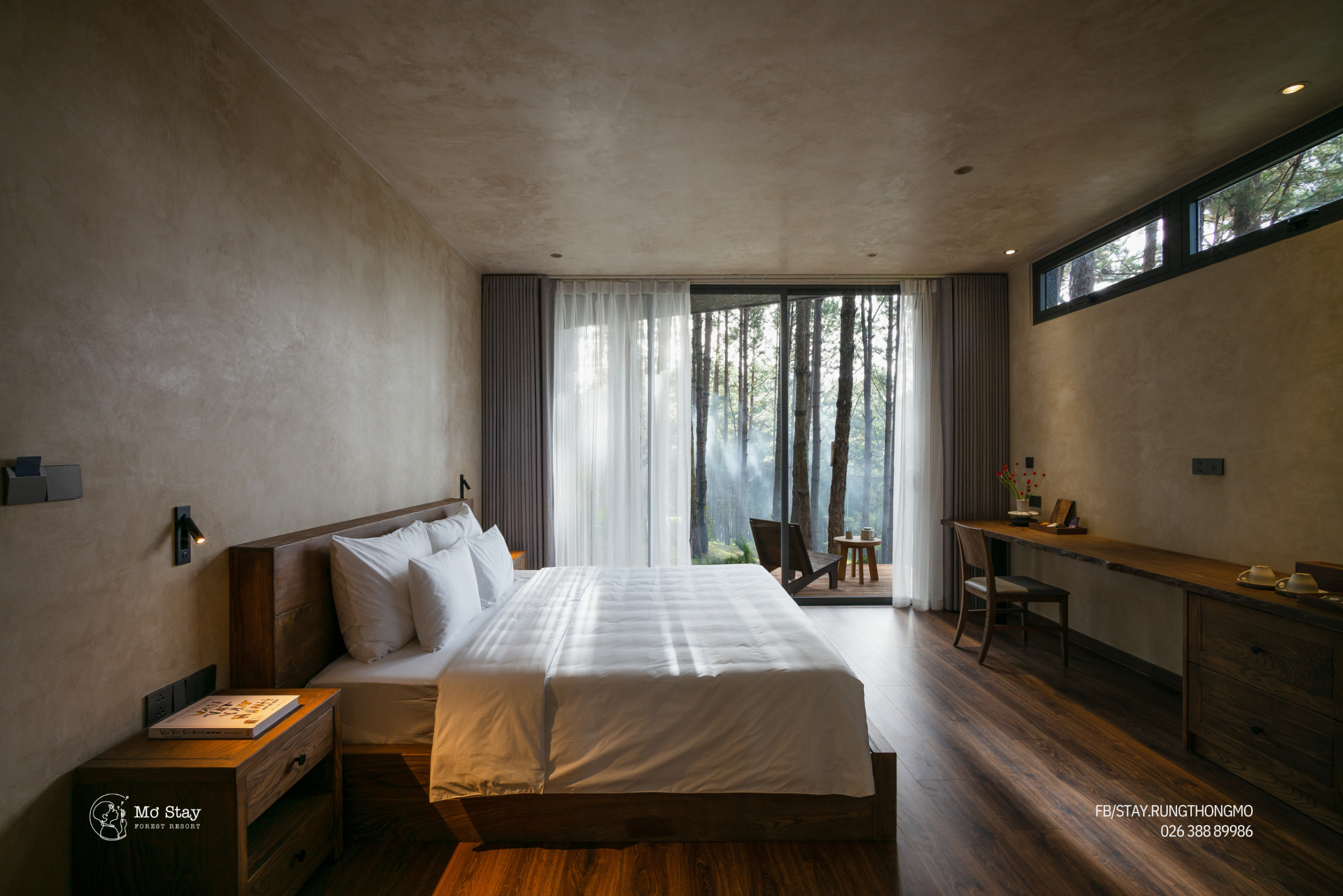 Bedroom with a pine forest view at Mơ Stay Forest Resort